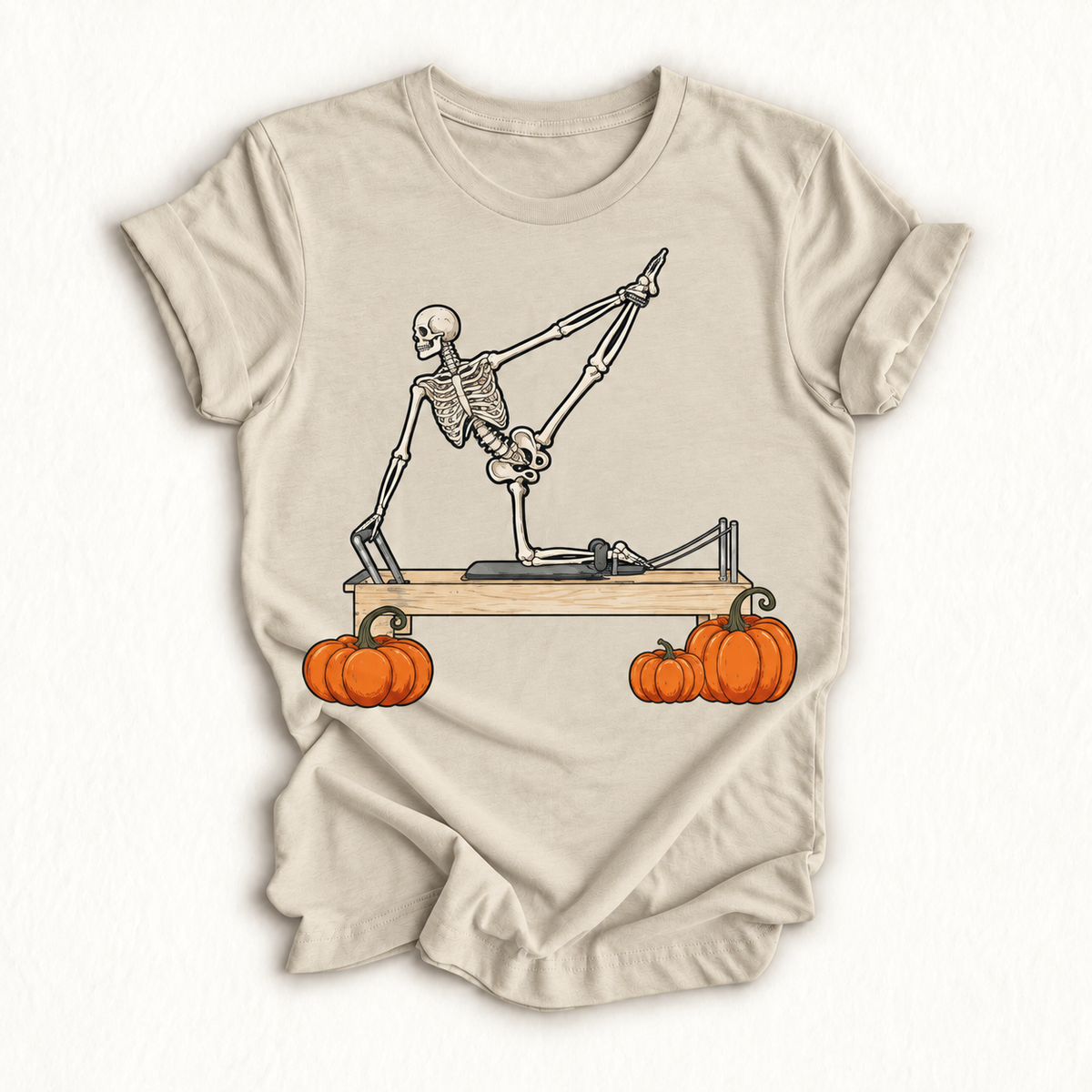 Skeleton Doing Reformer Pilates Machine Pumpkin Halloween T-Shirt