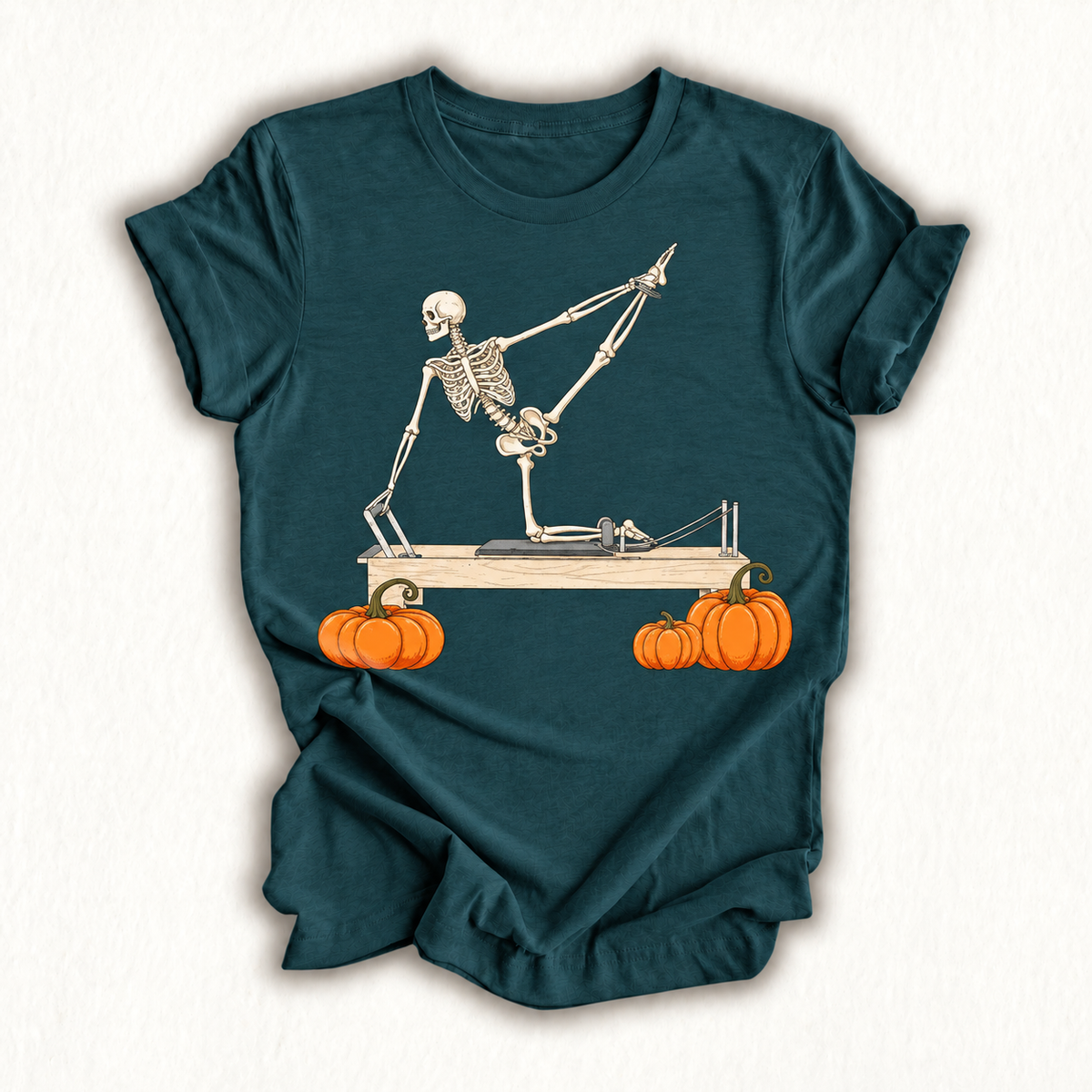 Skeleton Doing Reformer Pilates Machine Pumpkin Halloween T-Shirt