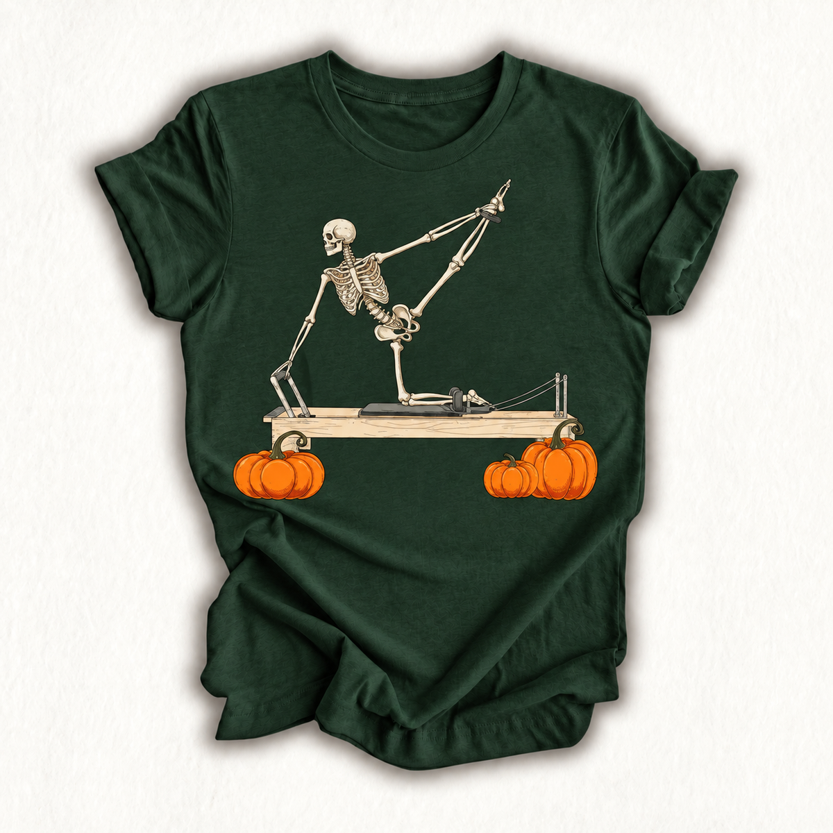 Skeleton Doing Reformer Pilates Machine Pumpkin Halloween T-Shirt