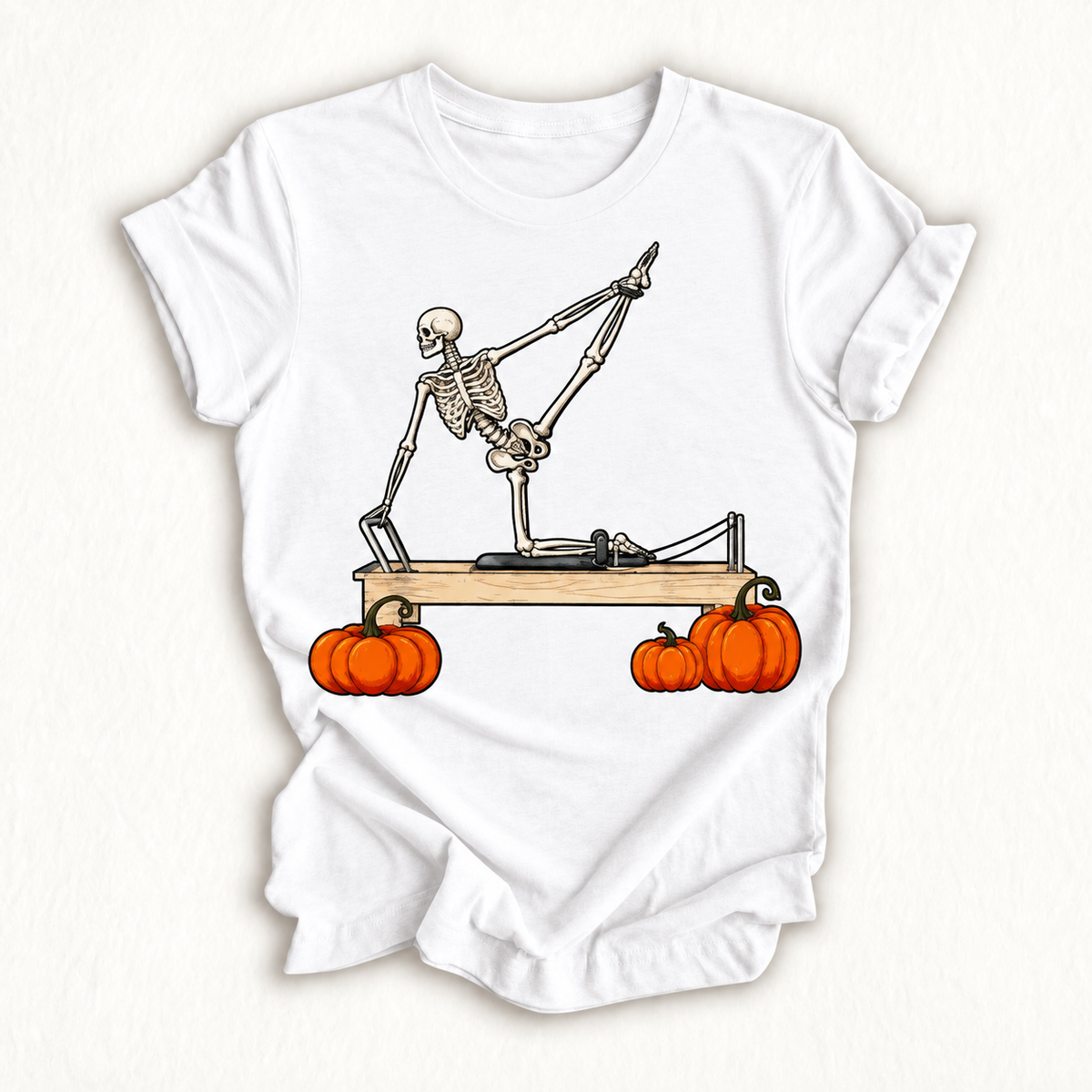 Skeleton Doing Reformer Pilates Machine Pumpkin Halloween T-Shirt